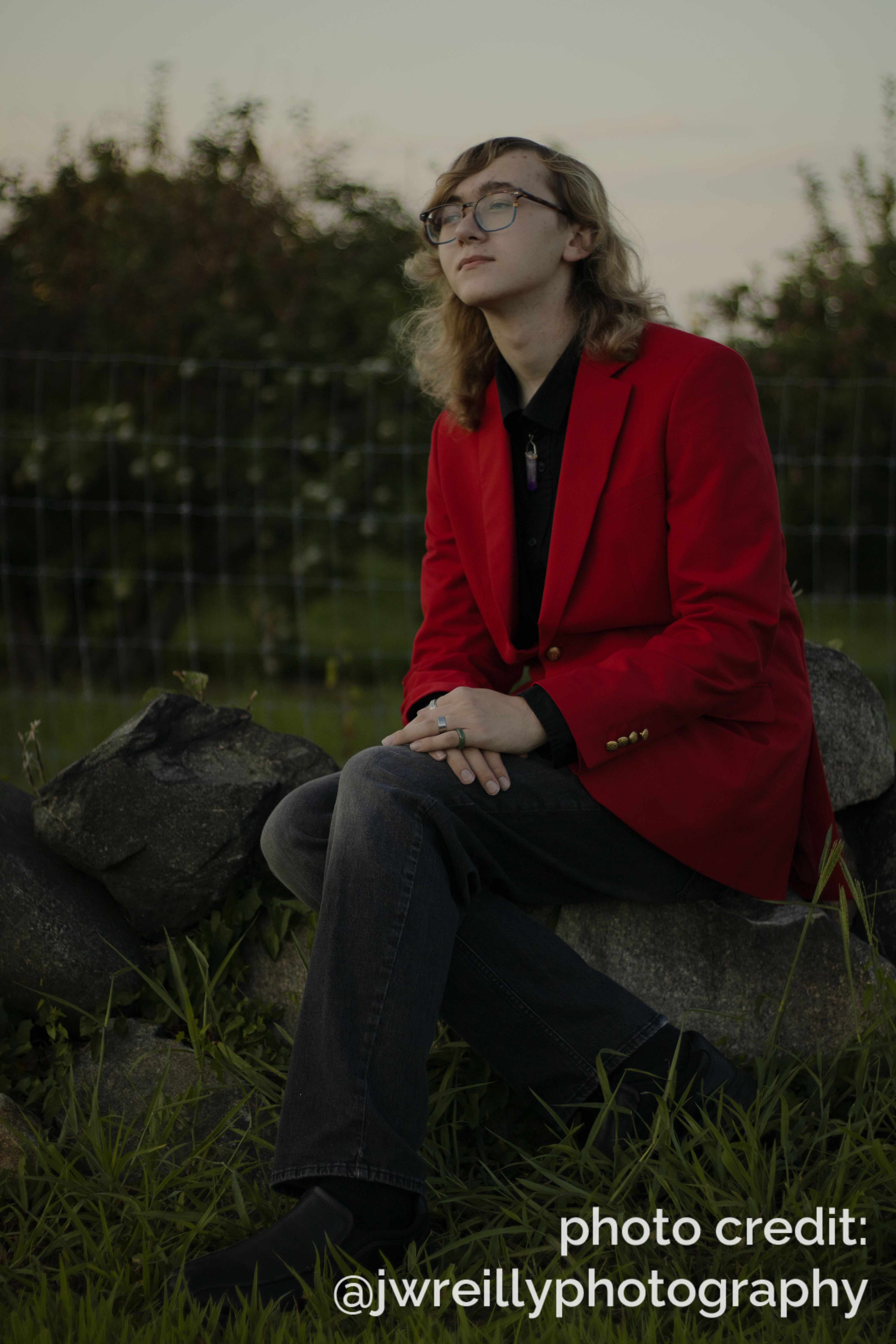 Dave sits on a rock